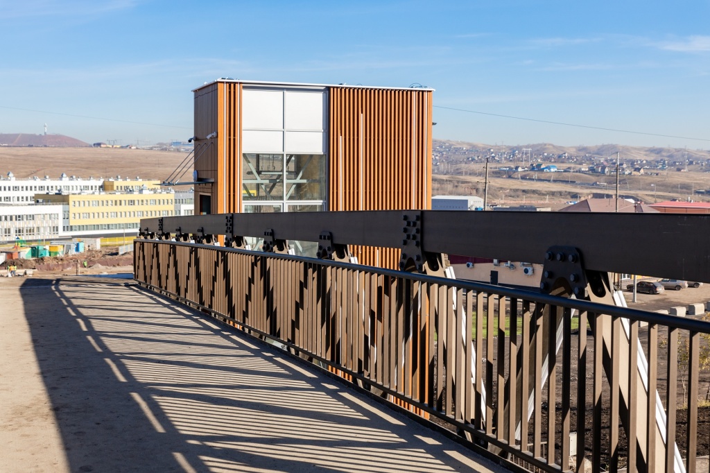 The pathway to knowledge: a new aluminium bridge in Krasnoyarsk leads to a new-built school