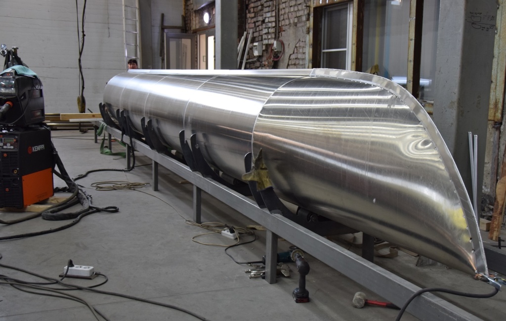 Welding the parts of the soon-to-be catamaran